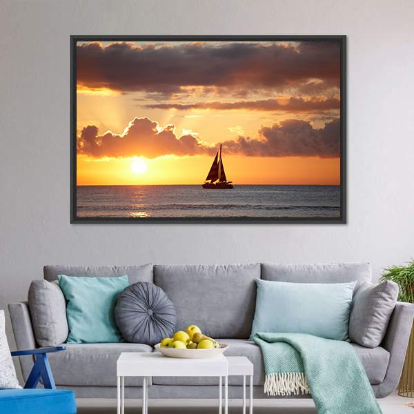 Sailboat at Sunset Over Ocean Canvas Wall Art in orange, yellow and blue, framed canvas, product view on a white background
