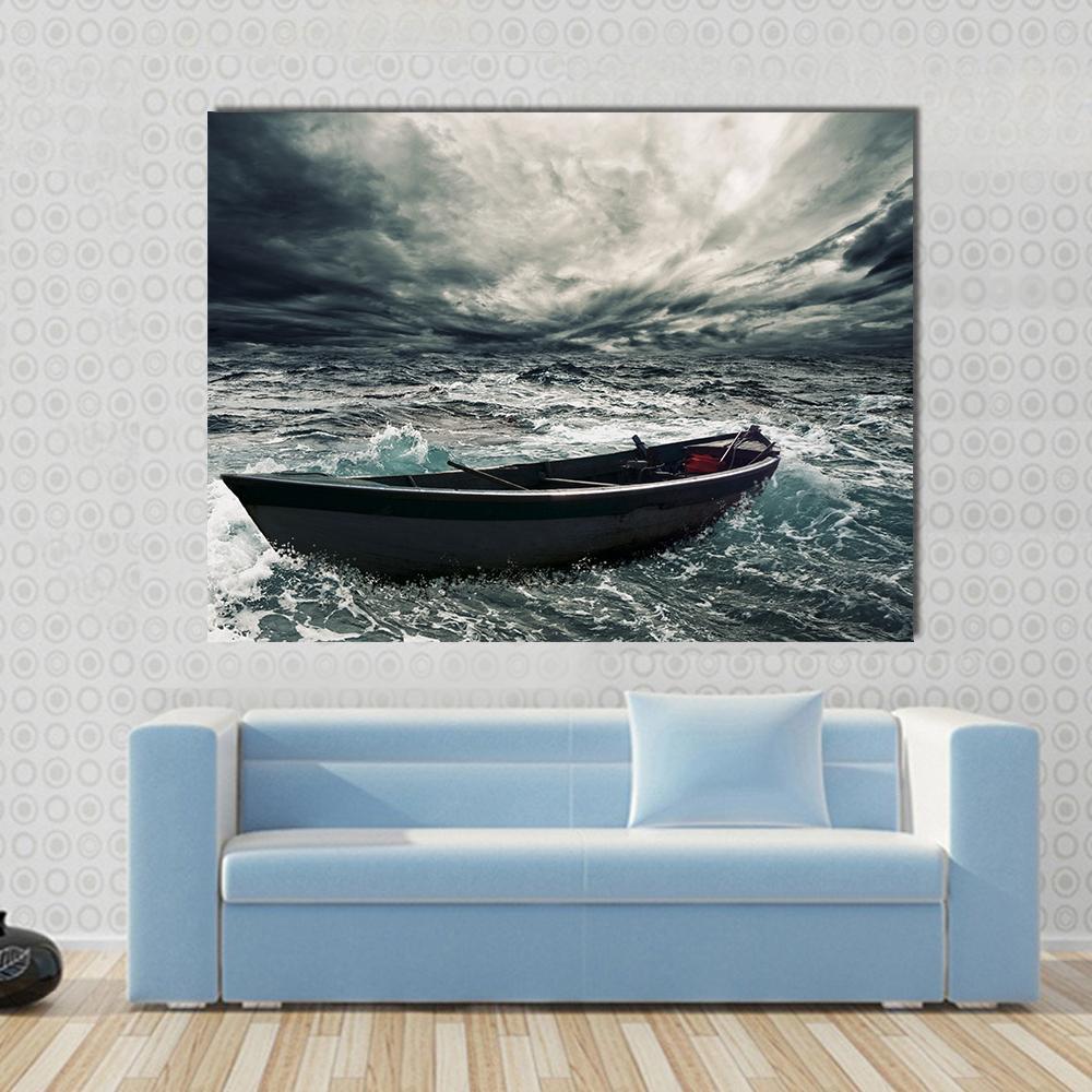 Small Wooden Boat in Stormy Sea Canvas Wall Art in black, gray and blue, single panel hung on a wall