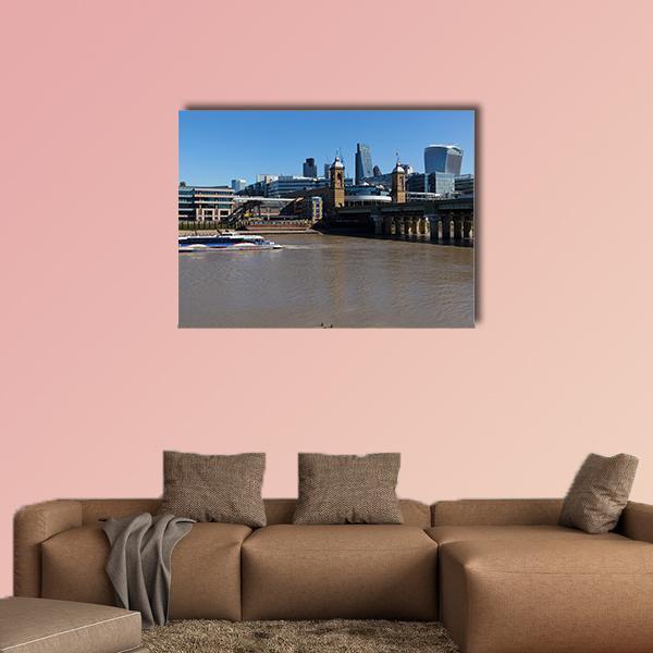 Boat on the Thames River Canvas Wall Art in gray, brown and blue, single panel hung on a wall