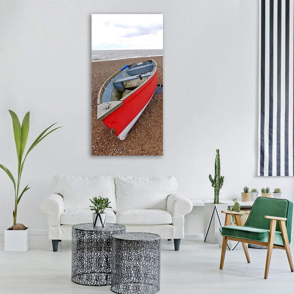 Red and Blue Rowboat on Pebble Beach Vertical Canvas Wall Art in gray, brown and red, single vertical panel hung on a wall