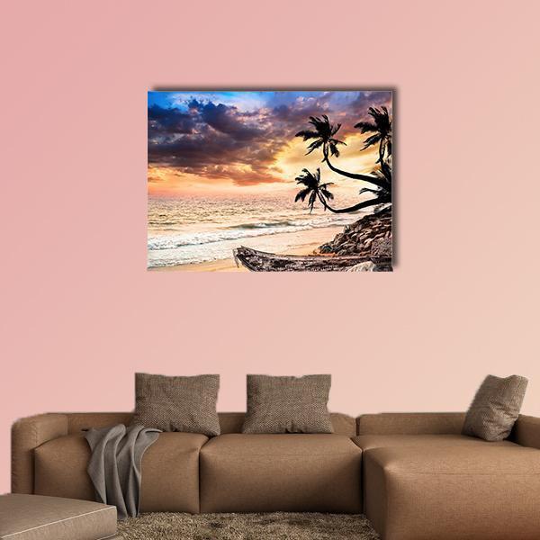 Tropical Sunset Beach with Wrecked Boat Canvas Wall Art in beige, orange and blue, single panel hung on a wall