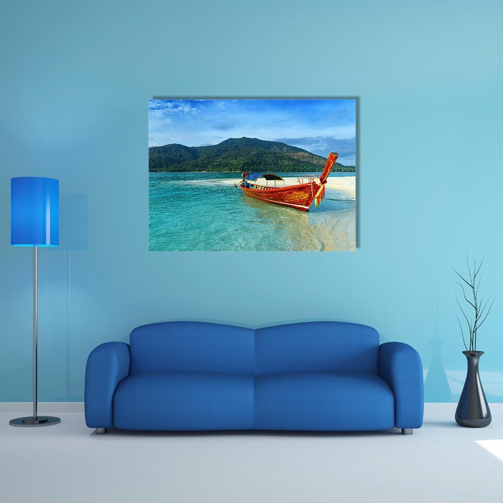 Longtail Boat on Turquoise Beach Canvas Wall Art in white, green and blue, single panel hung on a wall