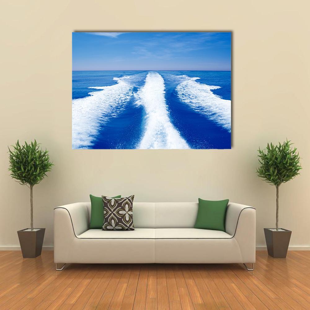 Boat Wake Prop Wash Canvas Wall Art in white and blue, single panel hung on a wall