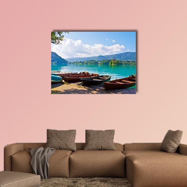 Boats at Bled Lake Canvas Wall Art in brown, green and blue, single panel hung on a wall