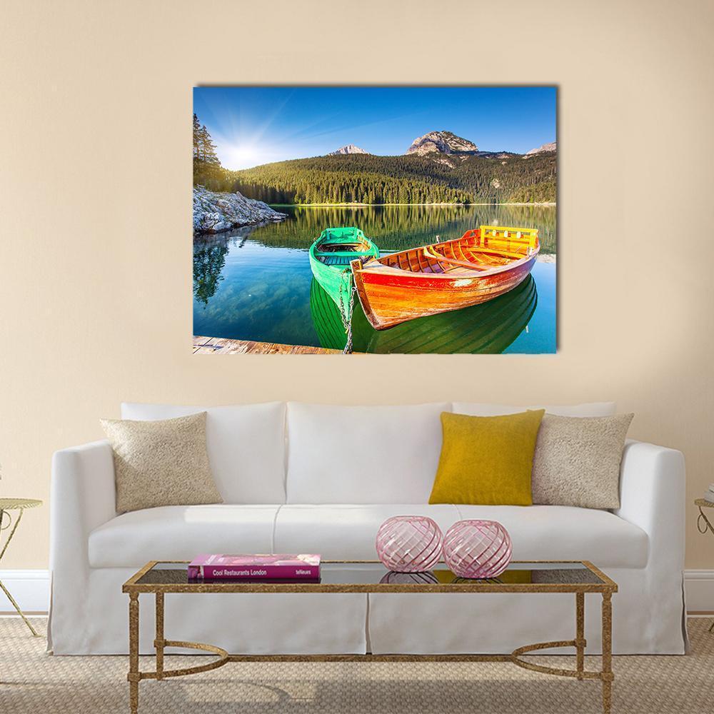 Boats on Lake in Montenegro Canvas Wall Art in orange, green and blue, single panel hung on a wall