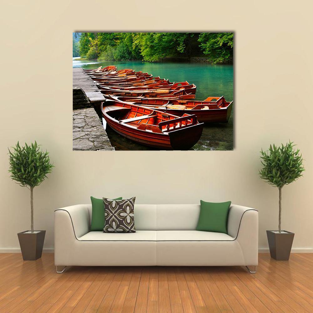 Rowboats on Green Lake Canvas Wall Art in brown, green and blue, single panel hung on a wall