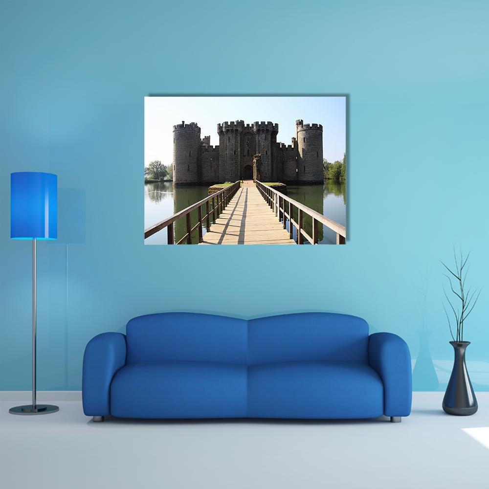 Bodiam Castle with Drawbridge and Moat Canvas Wall Art in gray, brown and blue, single panel hung on a wall