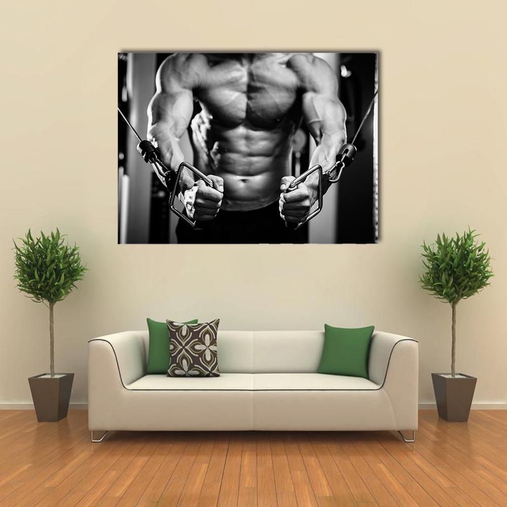 Bodybuilder in Intense Workout Canvas Wall Art in black, white and gray, single panel hung on a wall