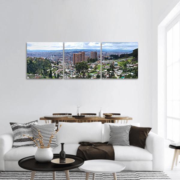 Bogota Urban Landscape Panoramic Canvas Wall Art in gray, green and blue, hung on a wall