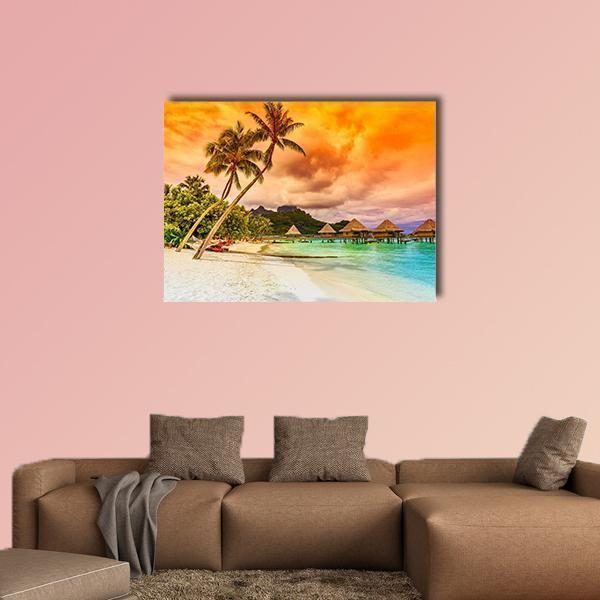 Bora Bora Overwater Bungalows at Sunset Canvas Wall Art in orange, yellow and blue, single panel hung on a wall