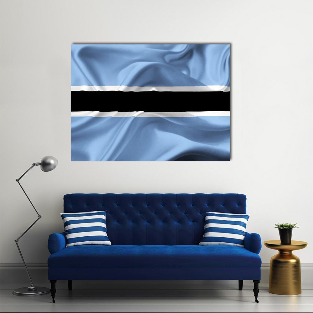 Waving Botswana Flag Canvas Wall Art in black, white and blue, single panel hung on a wall