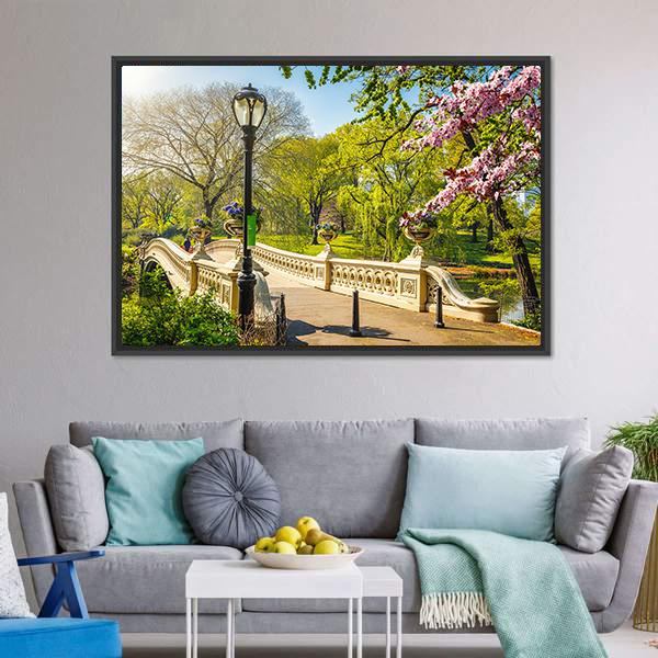 Bow Bridge in Central Park Canvas Wall Art in beige, green and blue, framed canvas, product view on a white background