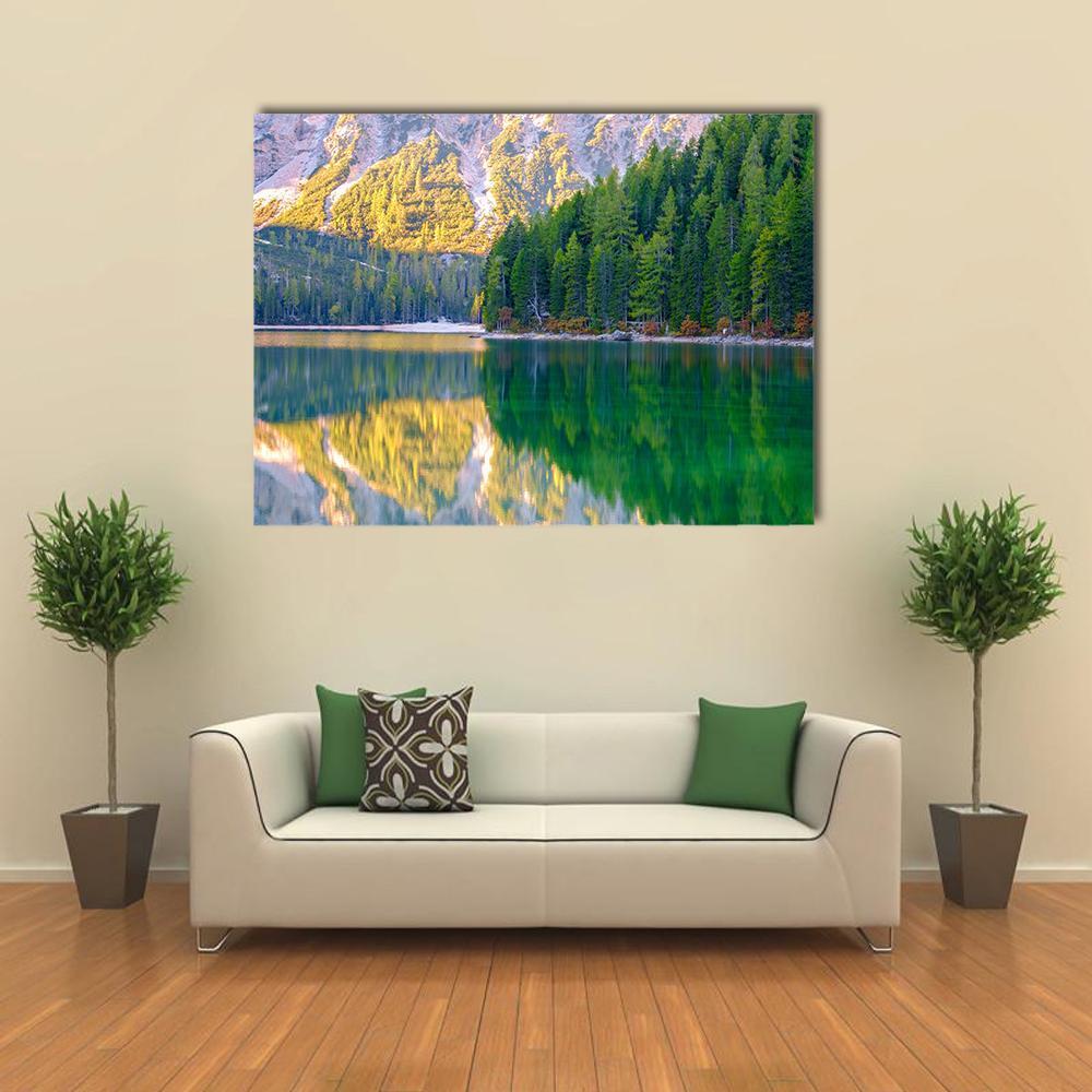 Braies Lake Reflections in the Dolomites Canvas Wall Art in yellow, green and blue, single panel hung on a wall
