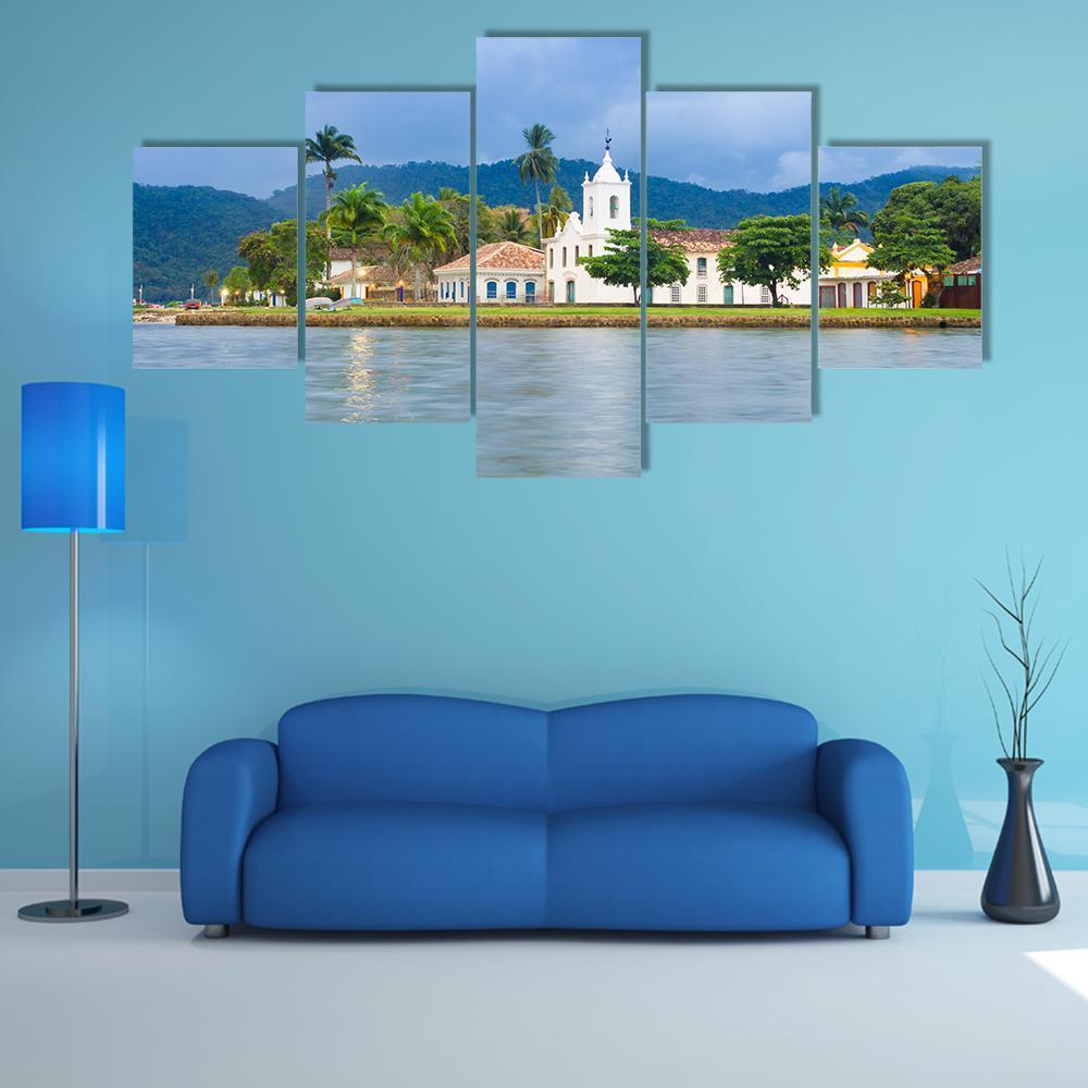 Brazilian Imperial Waterfront Town Canvas Wall Art in white, green and blue, 5 panel Star layout hung on a wall