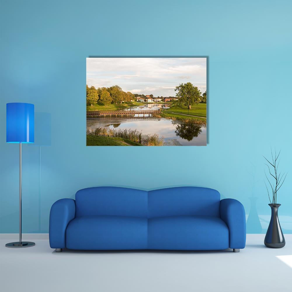 Old City Bridge in Norway Canvas Wall Art in white, green and blue, single panel hung on a wall