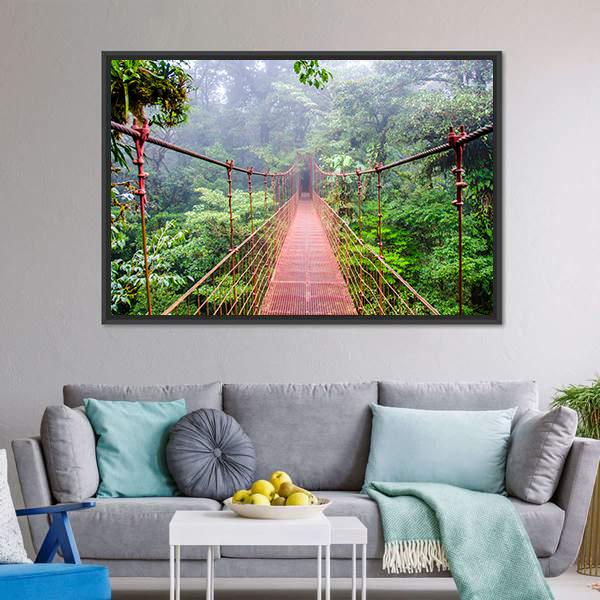 Red Suspension Bridge in Misty Forest Canvas Wall Art in gray, red and green, framed canvas, product view on a white background
