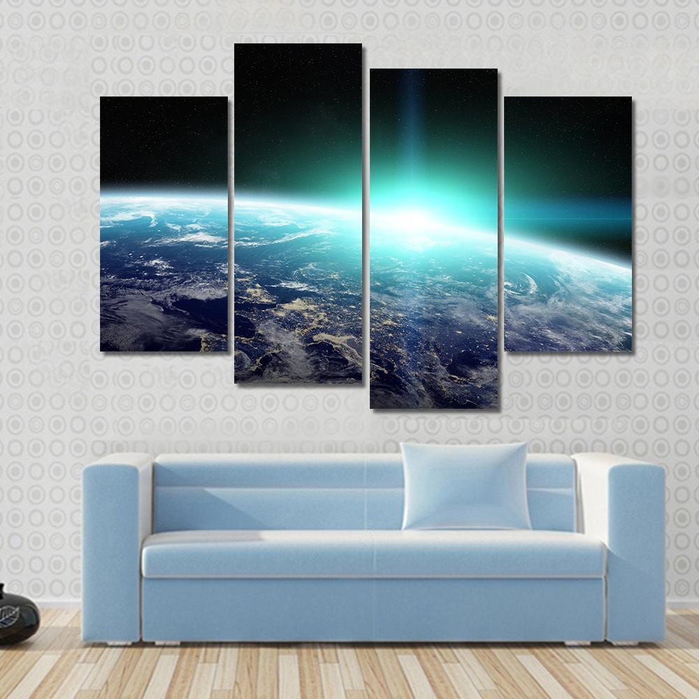 Bright Sun Over Planet Earth Canvas Wall Art in black, white and blue, 4 panel Pop layout hung on a wall
