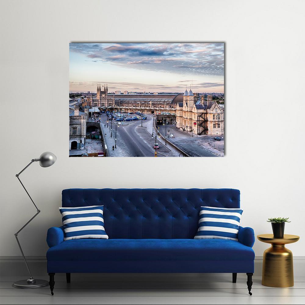 Twilight Train Station Skyline Canvas Wall Art in gray, beige and blue, single panel hung on a wall