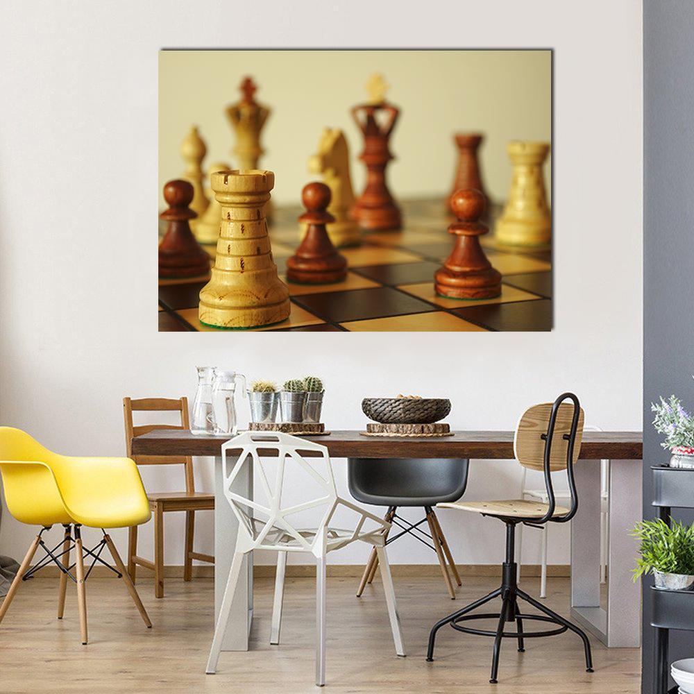 Brown Chess Pieces Canvas Wall Art in beige and brown, single panel hung on a wall