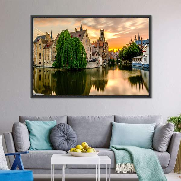 Bruges Canal Cityscape at Sunset Canvas Wall Art in orange, yellow and green, framed canvas, product view on a white background