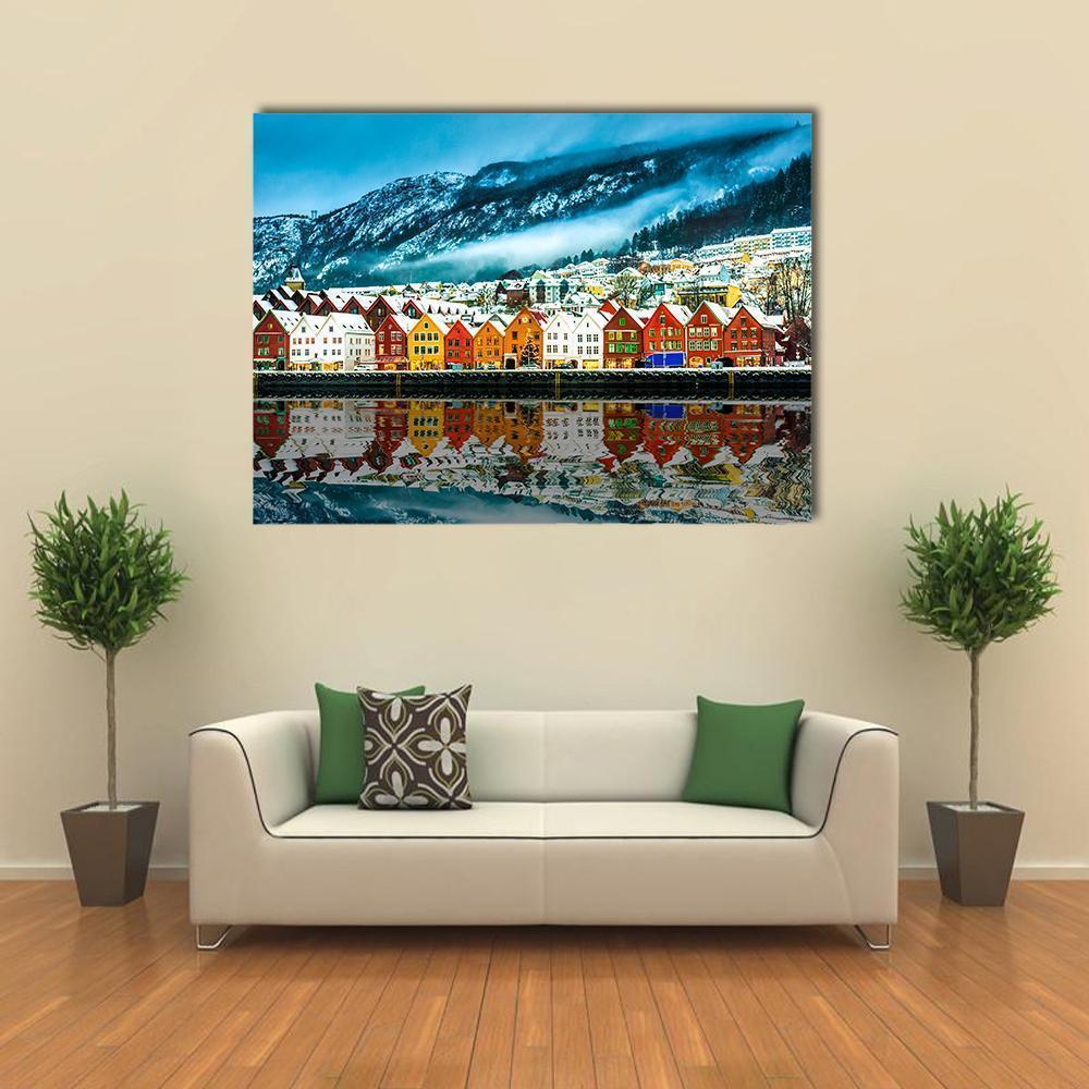 Snowy Bergen Waterfront Reflection Canvas Wall Art in white, blue and multicolor, single panel hung on a wall