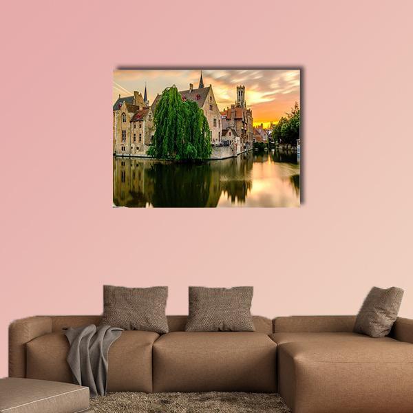 Bruges Canal Cityscape at Sunset Canvas Wall Art in orange, yellow and green, single panel hung on a wall