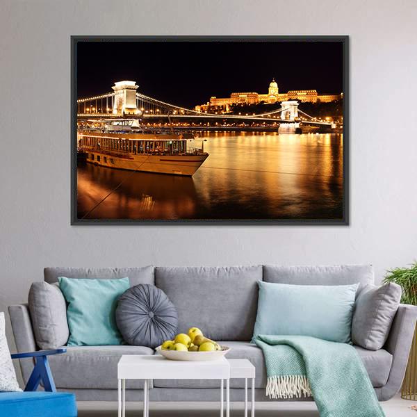 Budapest Chain Bridge at Night Canvas Wall Art in black, gold and yellow, framed canvas, product view on a white background