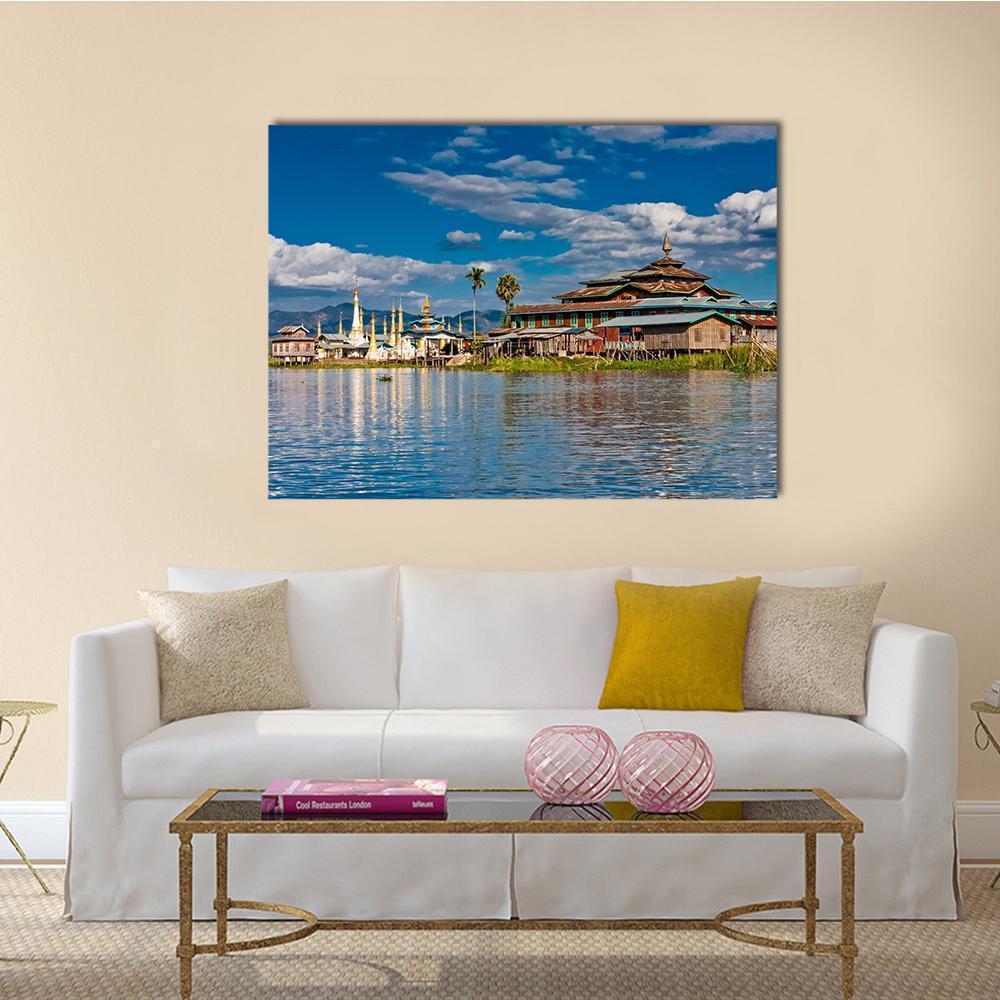 Lakeside Buddhist Monastery Canvas Wall Art in white, brown and blue, single panel hung on a wall