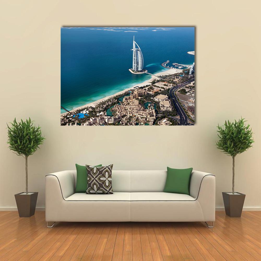 Burj Al Arab Aerial View Canvas Wall Art in white and blue, single panel hung on a wall