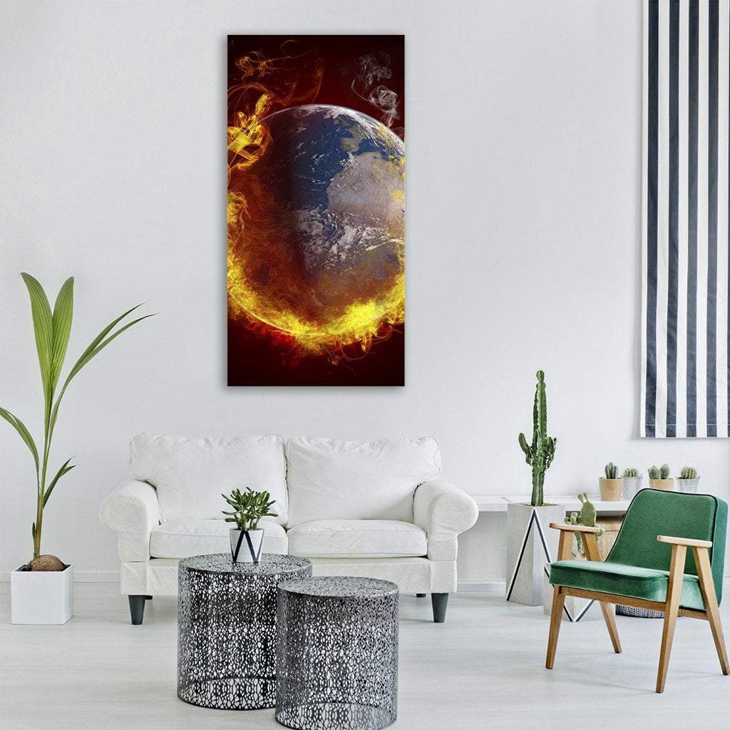 Burning Planet Earth Vertical Canvas Wall Art in black, orange and yellow, single vertical panel hung on a wall