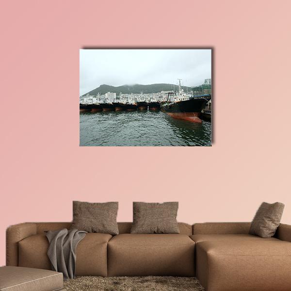 Busan Port Cargo Ships Canvas Wall Art in black, gray and blue, single panel hung on a wall
