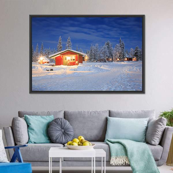 Cozy Winter Cabin at Night Canvas Wall Art in white and blue, framed canvas, product view on a white background