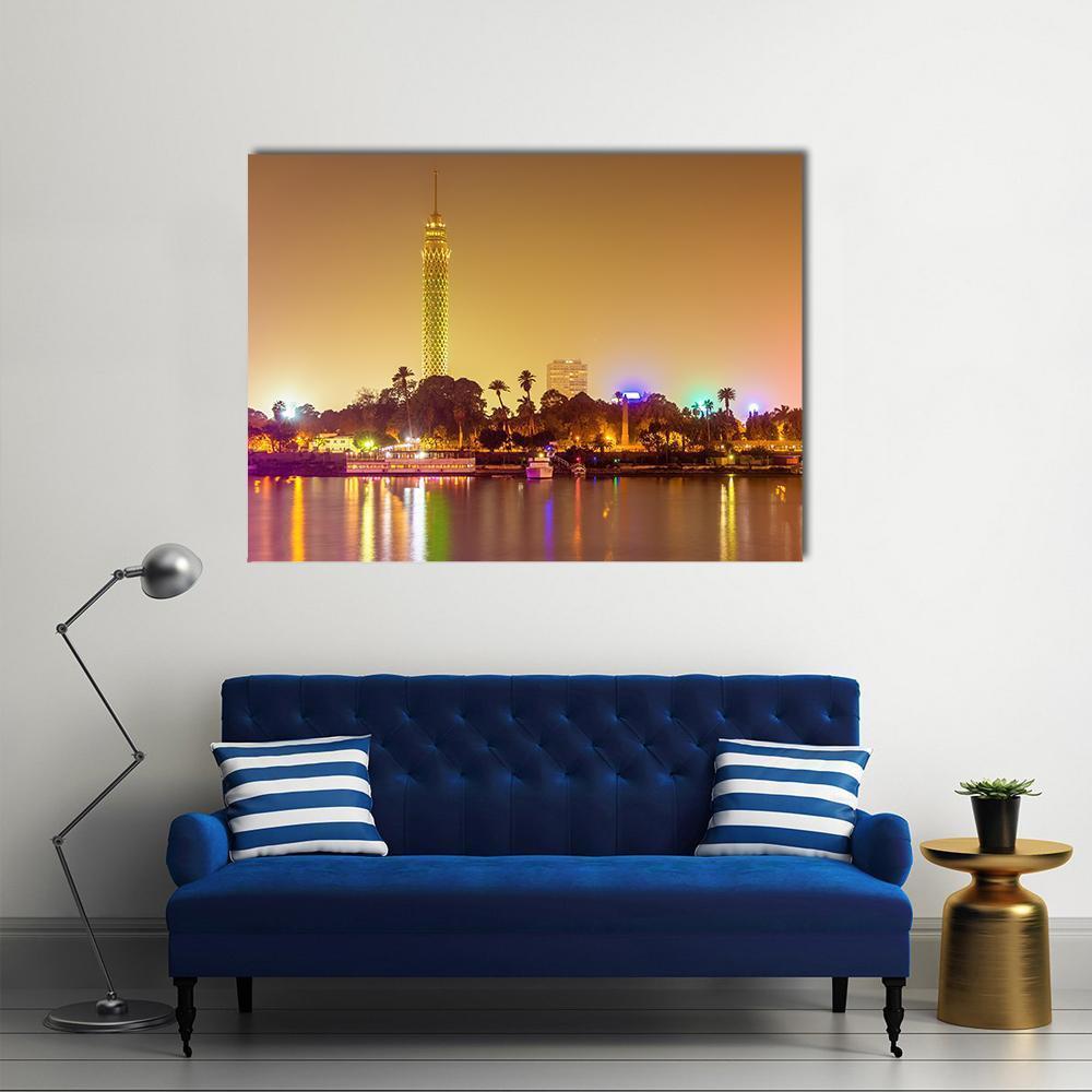 Evening Skyline of Cairo Canvas Wall Art in brown, orange and yellow, single panel hung on a wall