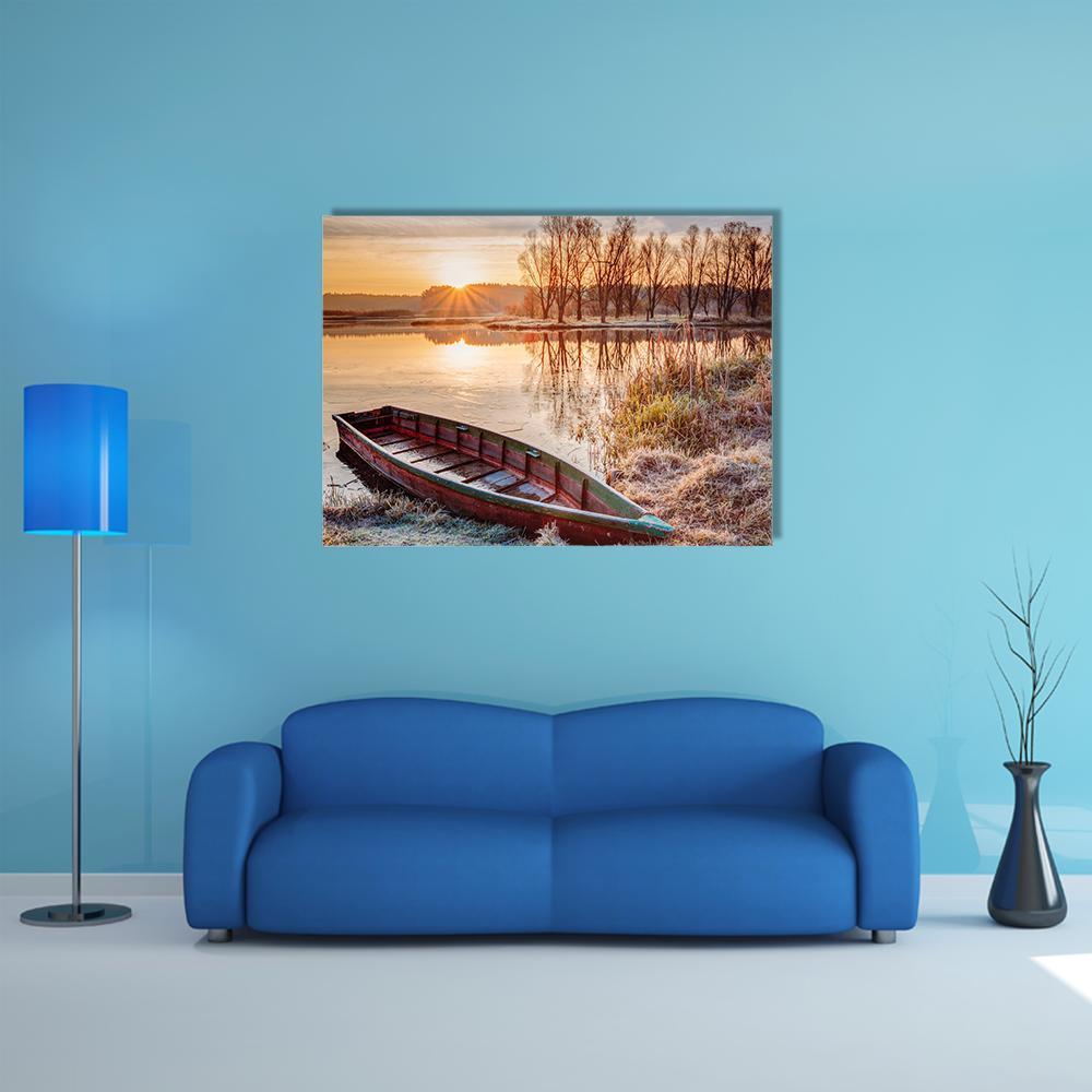 Boat on Icy Shore at Sunrise Canvas Wall Art in brown, orange and yellow, single panel hung on a wall