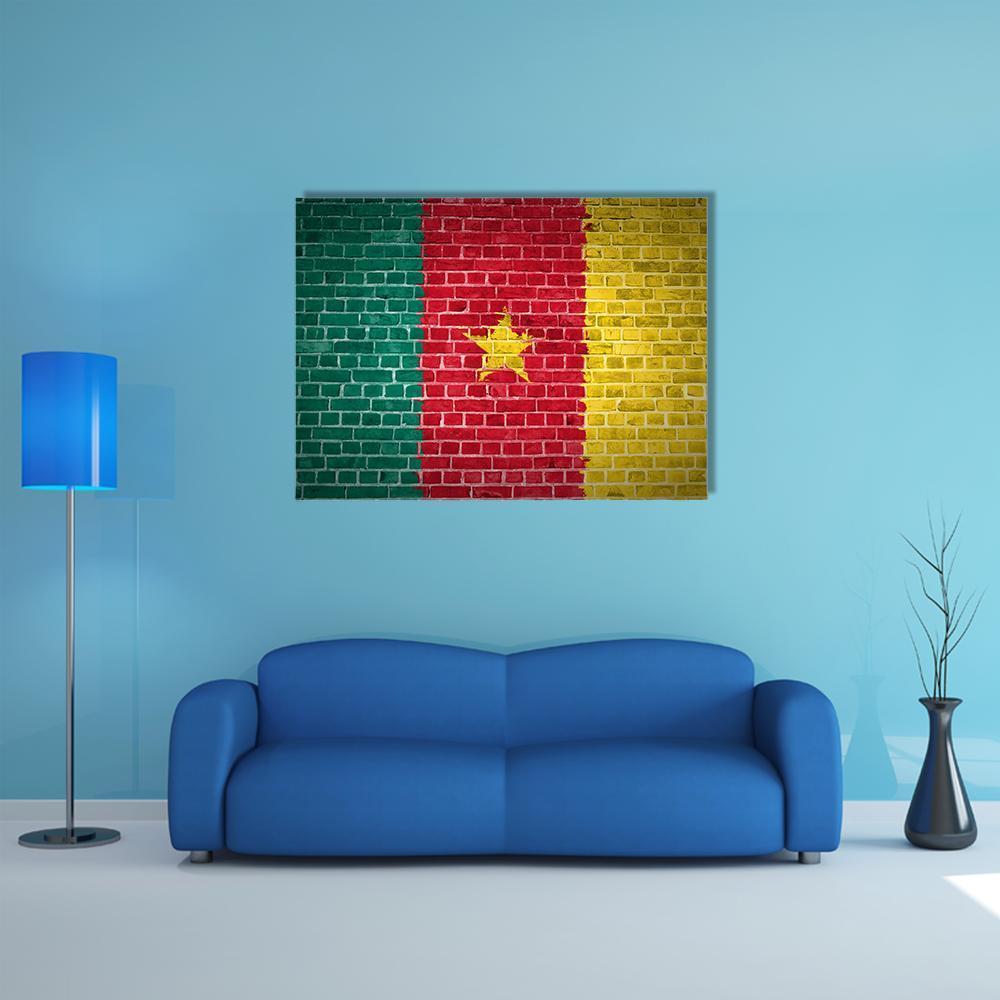Cameroon Flag with Brick Texture Canvas Wall Art in red, yellow and green, single panel hung on a wall