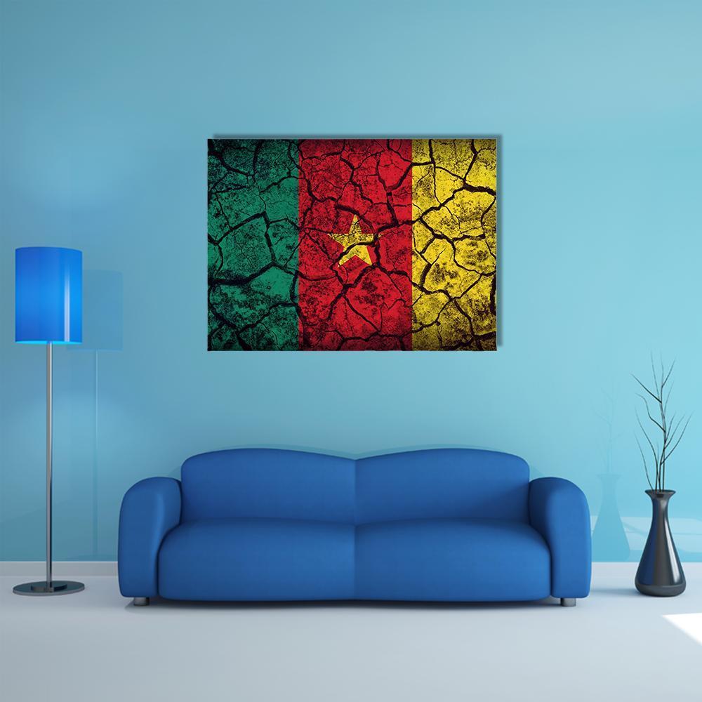 Cameroon Flag on Cracked Earth Canvas Wall Art in red, yellow and green, single panel hung on a wall