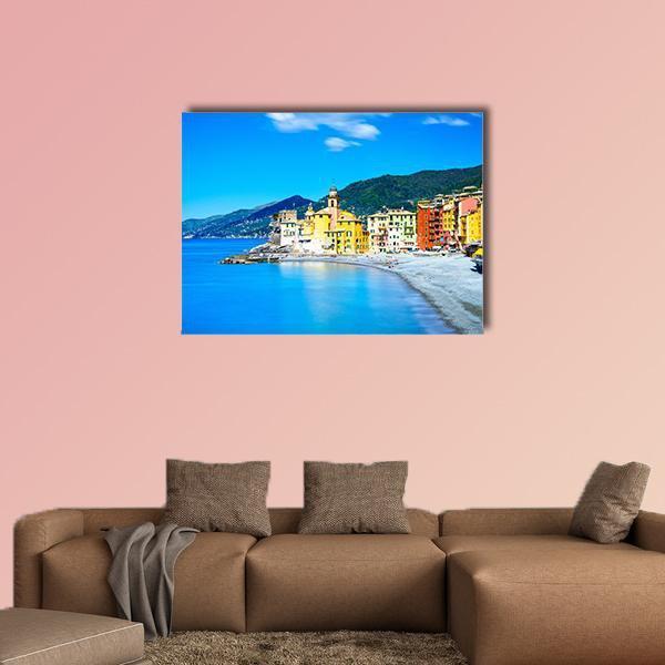 Old Church in Colorful Coastal Town Canvas Wall Art in yellow, blue and multicolor, single panel hung on a wall