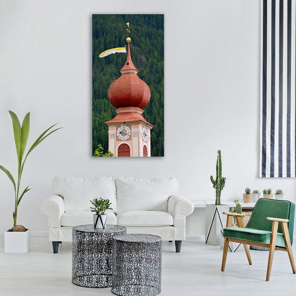 Campanile Watch Tower in Ortisei Valgardena Italy Vertical Canvas Wall Art in red and green, single vertical panel hung on a wall