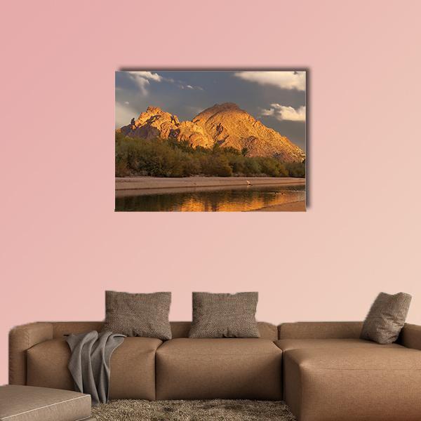 Mountain Canal at Sunset Canvas Wall Art in brown, gold and orange, single panel hung on a wall
