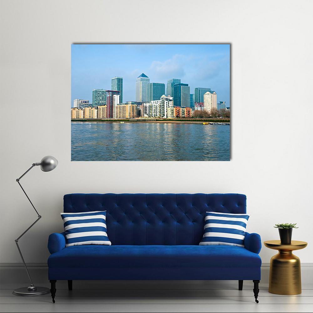 Canary Wharf Waterfront Skyline Canvas Wall Art in gray and blue, single panel hung on a wall