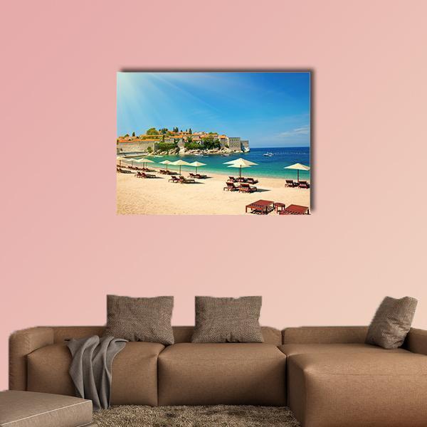 Lounge Chairs on Mediterranean Beach Canvas Wall Art in beige, yellow and blue, single panel hung on a wall
