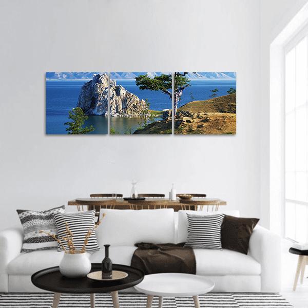 Desires Tree on Limestone Bluff Panoramic Canvas Wall Art in gray, brown and blue, hung on a wall