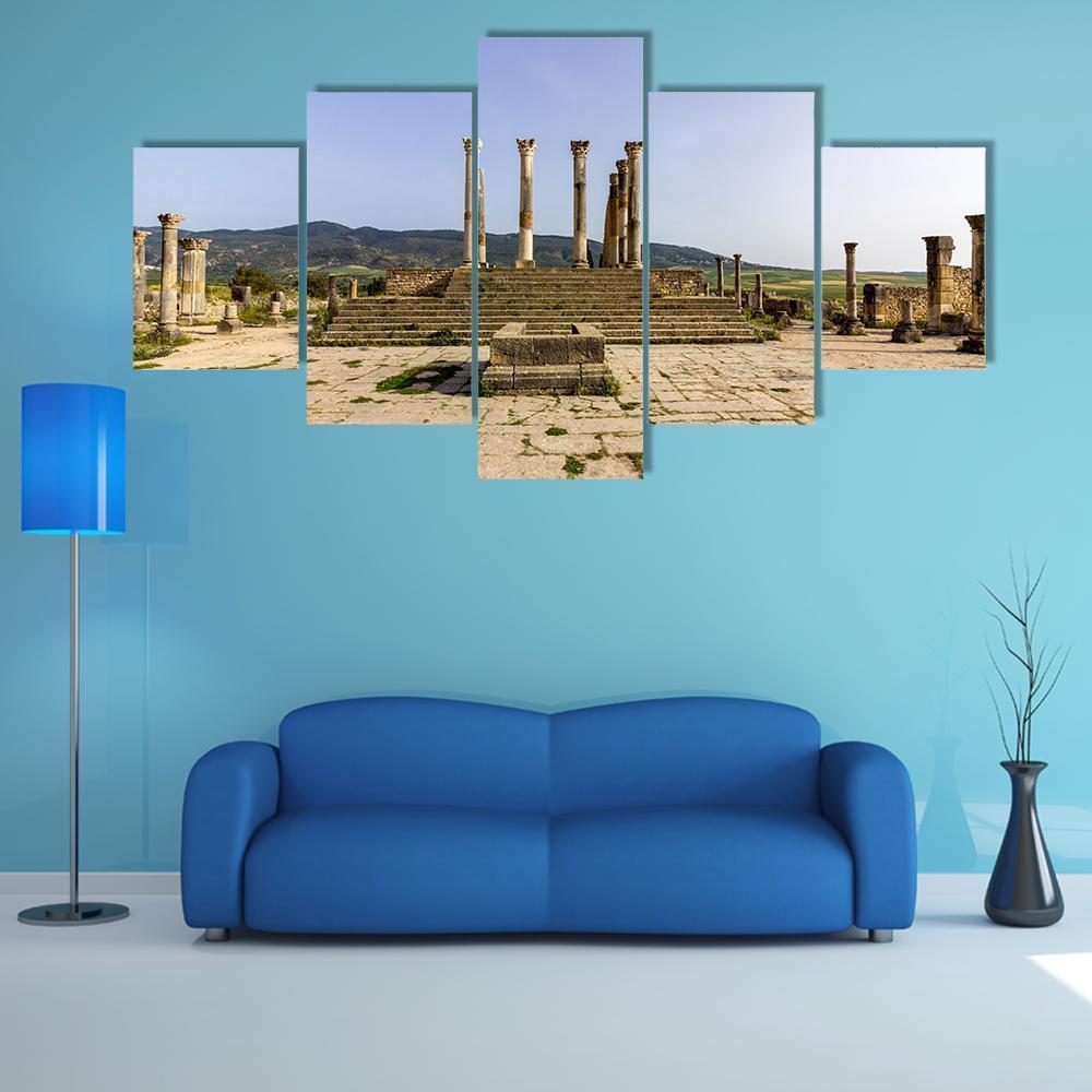 Capitoline Temple in Morocco Canvas Wall Art in gray, beige and blue, 5 panel Star layout hung on a wall