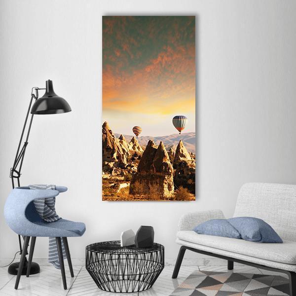 Cappadocia Hot Air Balloons at Golden Hour Vertical Canvas Wall Art in brown, orange and yellow, single vertical panel hung on a wall