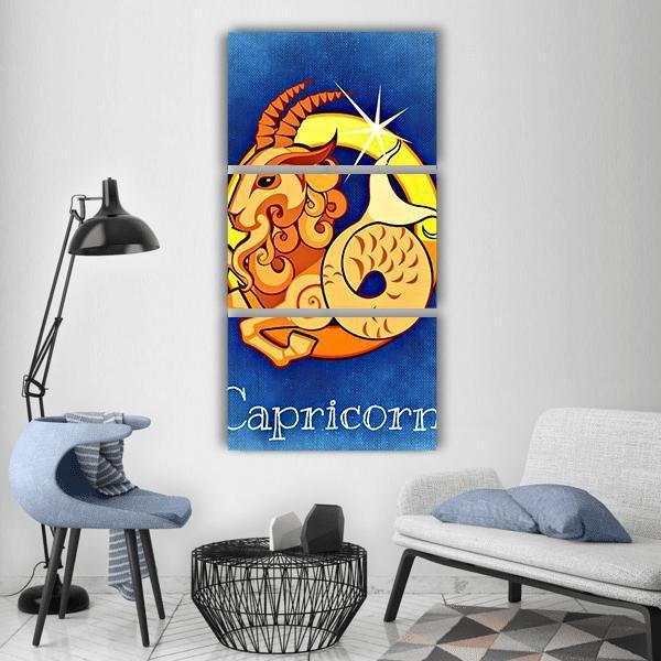 Capricorn Zodiac Sign Vertical Canvas Wall Art in orange, yellow and blue, hung on a wall