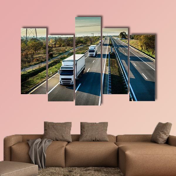 Caravan Of White Trucks Canvas Wall Art-5 Pop-Gallery Wrap-47" x 32"-Tiaracle