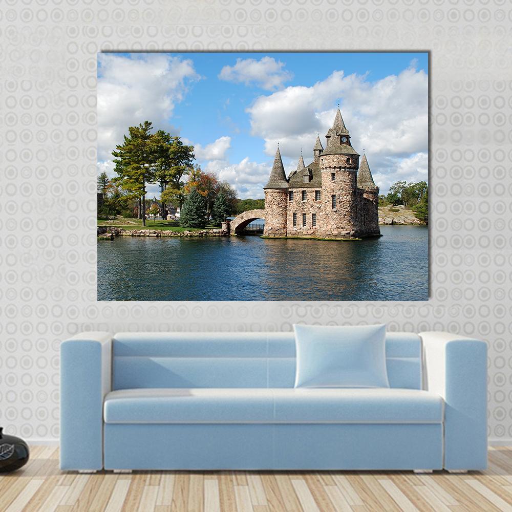 Castle on Heart Island Canvas Wall Art in white, brown and blue, single panel hung on a wall