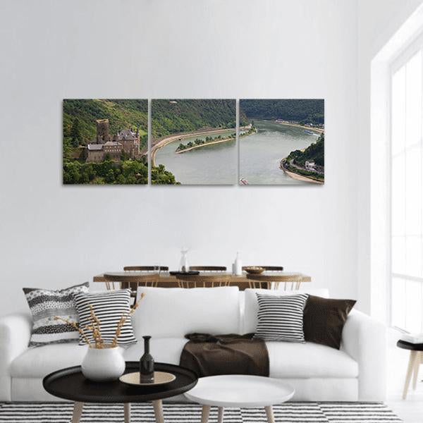 Rhineland Medieval Castle Over River Bend Panoramic Canvas Wall Art in gray, green and blue, hung on a wall
