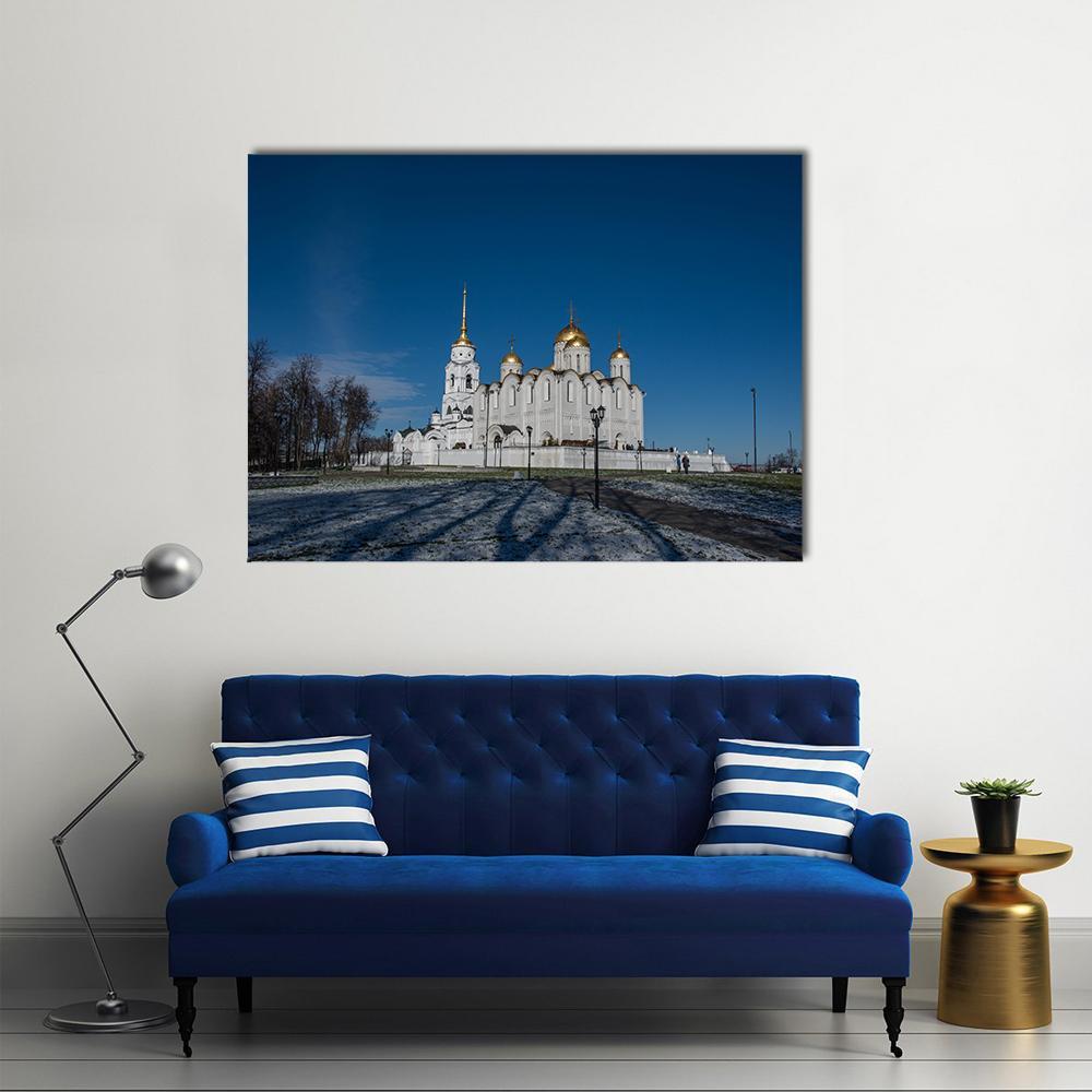 Snowy Cathedral with Golden Domes Canvas Wall Art in white, gold and blue, single panel hung on a wall