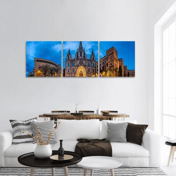 Cathedral of Saint Eulalia at Twilight Panoramic Canvas Wall Art in brown, yellow and blue, hung on a wall
